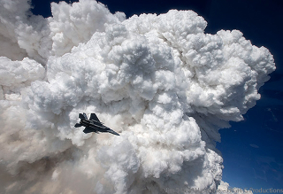 Illustration for article titled These Photos Of F-15s Flying Near Towering Forest Fires Are Totally Nuts